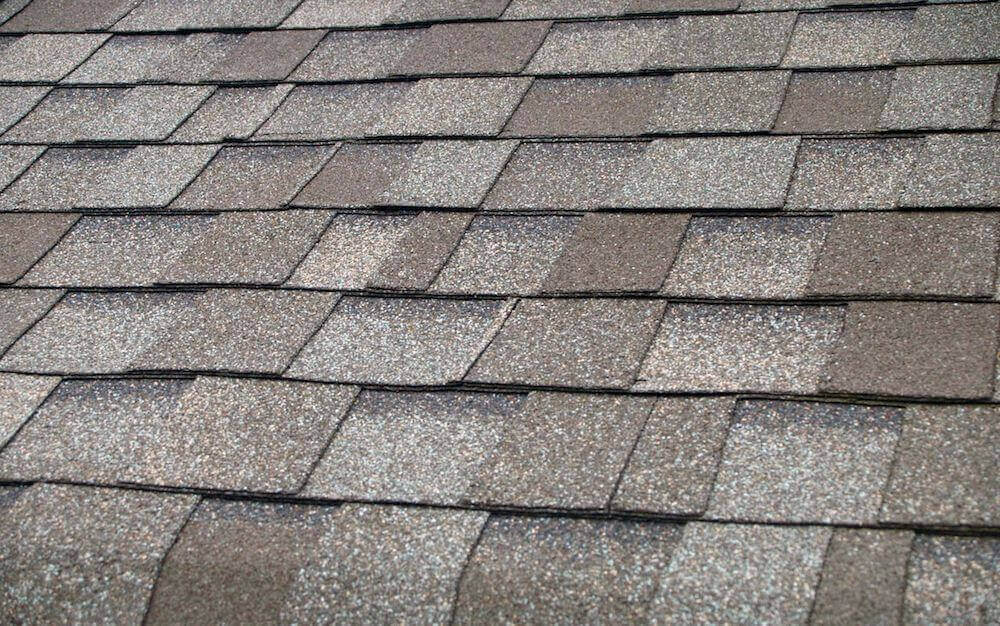 Architectural asphalt composition shingles — the most common residential roofing material in Central Texas